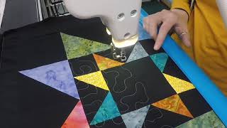 How to Quilt Stippling on a Scrappy Star Friendship Quilt Block