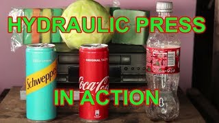 Hydraulic Press in Action vs. Sony CD Player