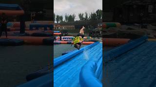 Flips On Slippery Water Park Thing. Not Very Bouncy Btw
