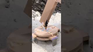 Mr.manhole On A Tractor Cuts Circles To Remove Manhole Frames