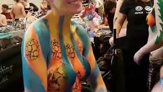 UV Sea Anemone/ Clownfish Bodypaint body Art Glastonbury Festival timelapse
