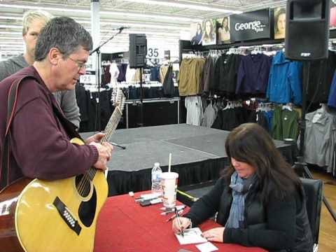 Jann Arden autographs my guitar