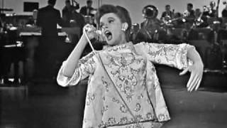 Watch Judy Garland I Feel A Song Coming On video