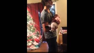 Uncle Holding And Rocking Ella Christmas