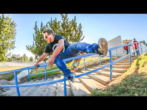 NEVER TRY THIS!  SKATER FAILS DOWN BIGGEST HANDRAIL!