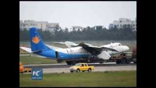 RAW: Chinese passenger plane skids off runway