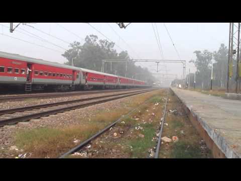 CNB WAP-4 hauling LHB Sampoorna Kranti Express giving way to...