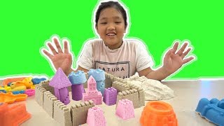 Play with big sand molds and toy shovels on outdoor playground / Surprise toys