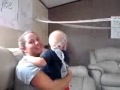 Grandpa teaches grandson not to bounce on a balloon