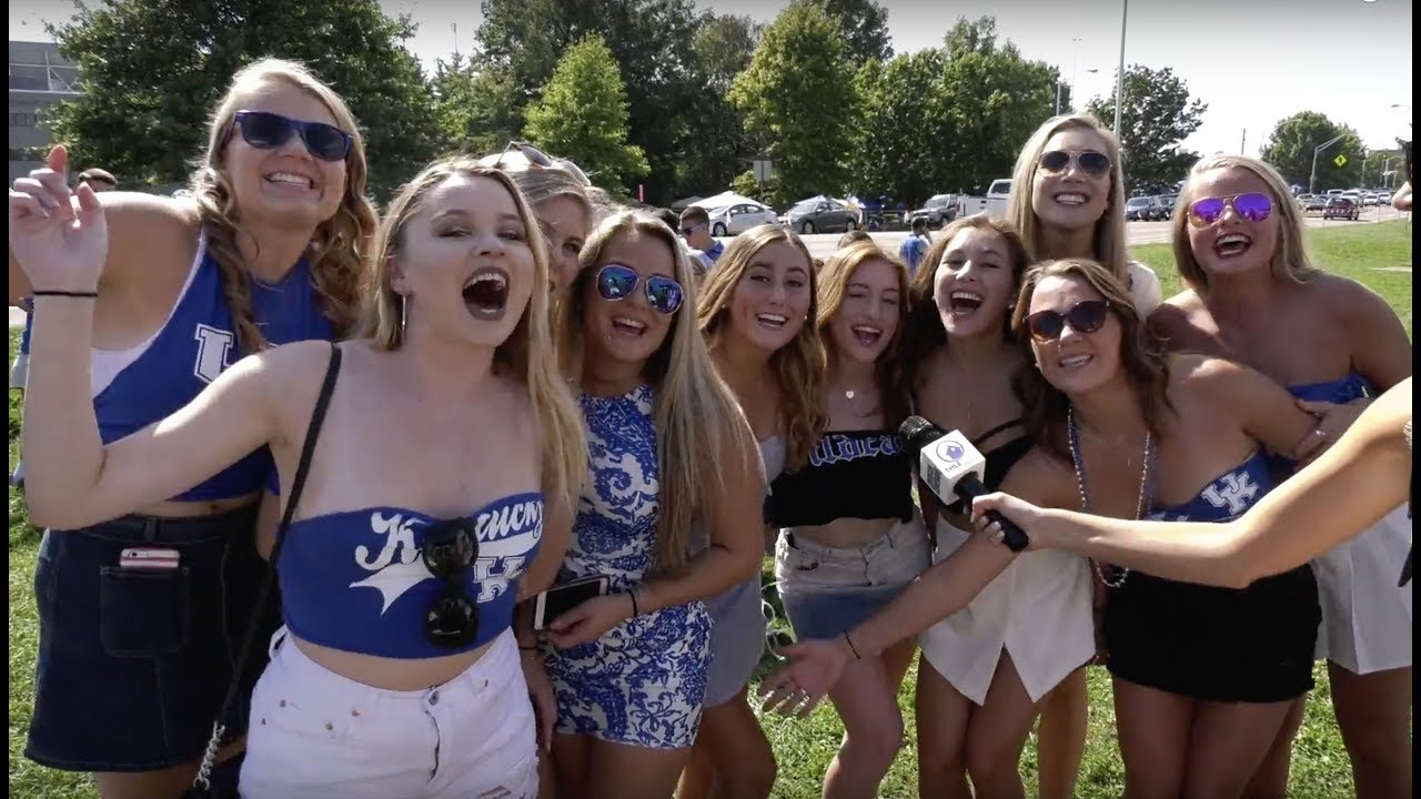 Partying flashing tits while tailgating outside