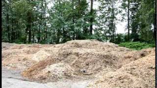 Brushless E Revo, Rustler RC Jumping at Wood Chip Pile