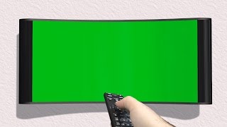 Tv With Green Screen Is Switched On With Remote Control - Free Use