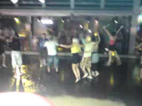 People Dancing In The Rain In