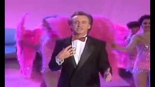 Watch Tony Christie Moonlight And Roses video