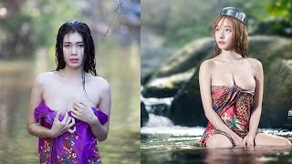 Asian Woman Wearing Traditional Clothes For Bathing At Countryside Very Refreshing