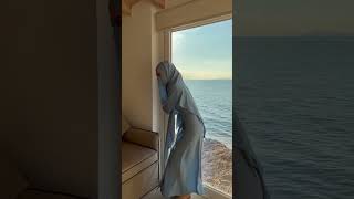 Matching The Blue Abaya With The Beach View. Full Outfit Available On .Fatimadetetuan