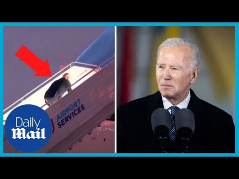 US President Joe Biden falls up stairs of Air Force One leaving Poland