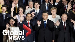 G20 Summit: World leaders pose for "family photo" in Osaka