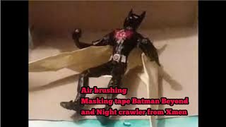 Air brushing Batman beyond and Night crawler in masking tape.