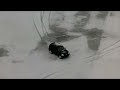 RAW video - Driver does donuts in Plano mall parking lot during Winter Storm