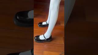 Black Mary Janes and White stockings