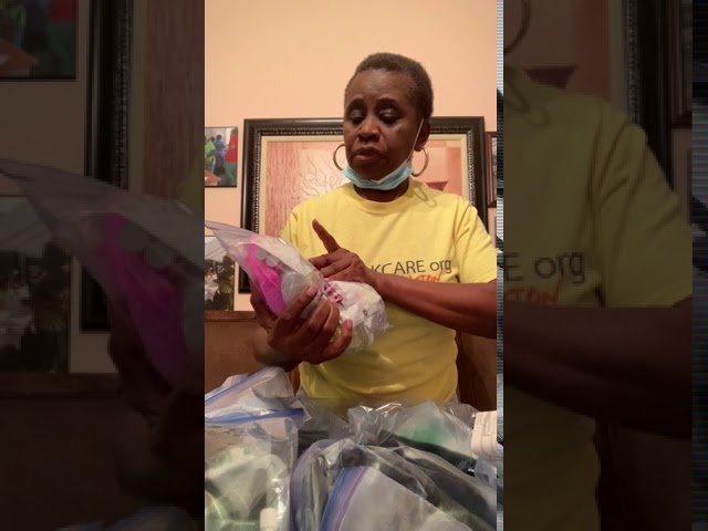 Mrs. Omolabake organizing donated hygienic products
