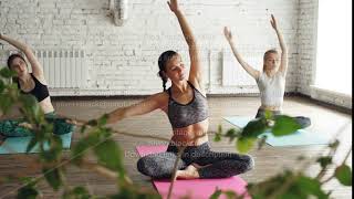 Flexible Young Women Are Doing Seated Side Bends From Lotus Position. Complex Of Stretching Asanas