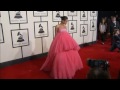 GRAMMY's: Rihanna hits the red carpet in a HUGE pink dress