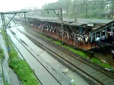 Rains stop Mumbai in tracks, commuters hit as trains cancelled.