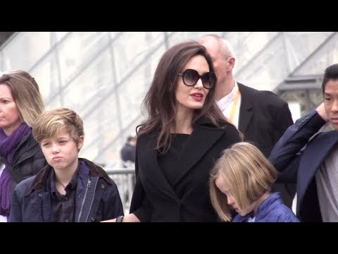 Angelina Jolie brings the all family to the Louvre Museum in Paris