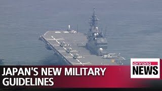 Japan adopts new defense guidelines, agrees to boost military spending over next 5 years