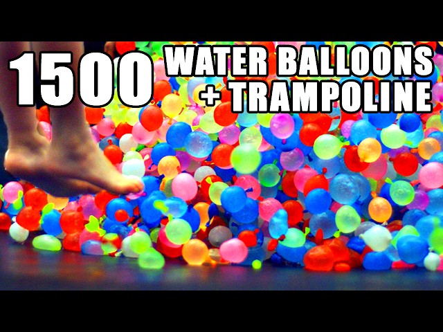 Playing With Hundreds Of Water Balloons On A Trampoline - Video