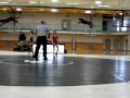 Izak wins with a pin.