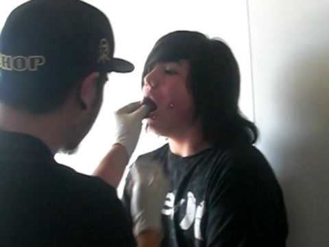cheek piercing