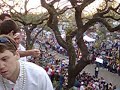 Title:Marching Band & Flambeaux Description:Mardi Gras 2006, from porch of B&C's.  This is from a digital camera...sound and picture quality not great.