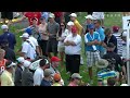 Kid celebrates Rory McIlroy giving him a golf ball at BMW
