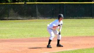 Kinder High School Freshman Brandon Norris stealing 3rd base