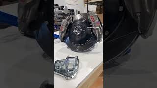 Seems Legit Garage Dual Caliper Setup