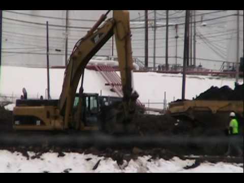 2011 caterpillar truck. Cat 345CL excavator loading