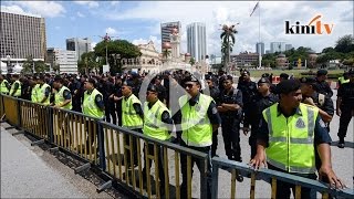 Police stand guard at Dataran Merdeka
