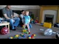 Ben James aged 2 building a tower