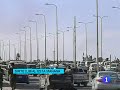 La imagen de Gadafi muerto marca el final de la guerra en Libia