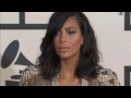 Grammy Awards: Kim Kardashian and Kanye West kiss for ages on the red carpet!