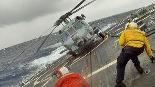 EXTREME SKILLS: Amazing military helicopter landing on ship deck in rough seas