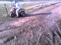 video de quad hytraque 80cc dans la boue 3