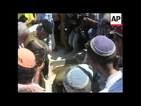 WRAP Israel OKs Egypt troops on Gaza border; remains reburied