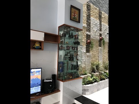 Kho Tư liệu Xây dựng - Tận dụng tường hộp gen để làm kệ trang trí trưng bày rượu và vật lưu niệm
