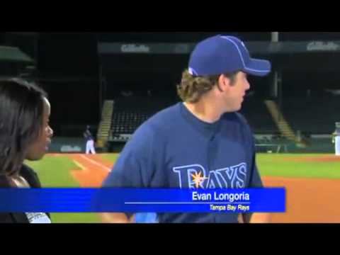 Evan Longoria Catches a ball during interview