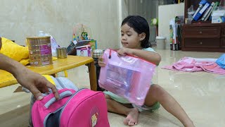 Daily Routine Of Proactive Girl Prepared School Bag And Milk Bag For Tomorrow