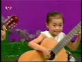 North Korea Children Playing the Guitar